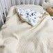 Пледик всесезонний у ліжечко та коляску 100х80 см Oh My Kids "Дино" молочний
